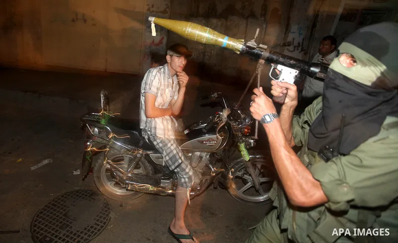 A Palestinian militant of Ezzedine al-Qassam Brigade, the military wing of the Palestinian Islamist movement Hamas which rules Gaza, participates in an anti-Israel military show in Gaza City October 1, 2012. Photo by Maj...
