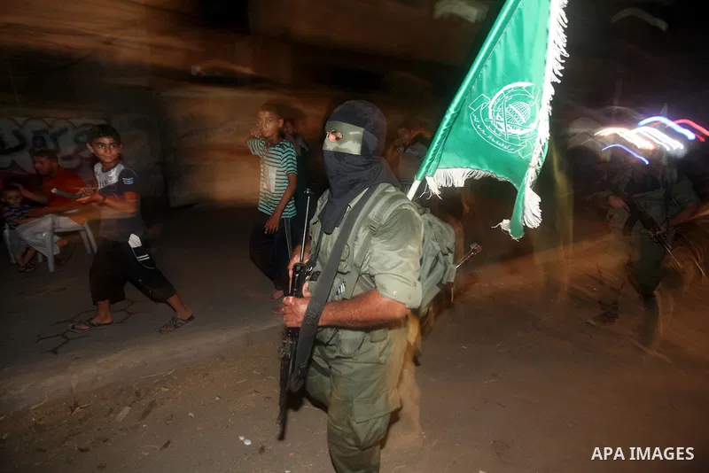 A Palestinian militant of Ezzedine al-Qassam Brigade, the military wing of the Palestinian Islamist movement Hamas which rules Gaza, participates in an anti-Israel military show in Gaza City October 1, 2012. Photo by Maj...
