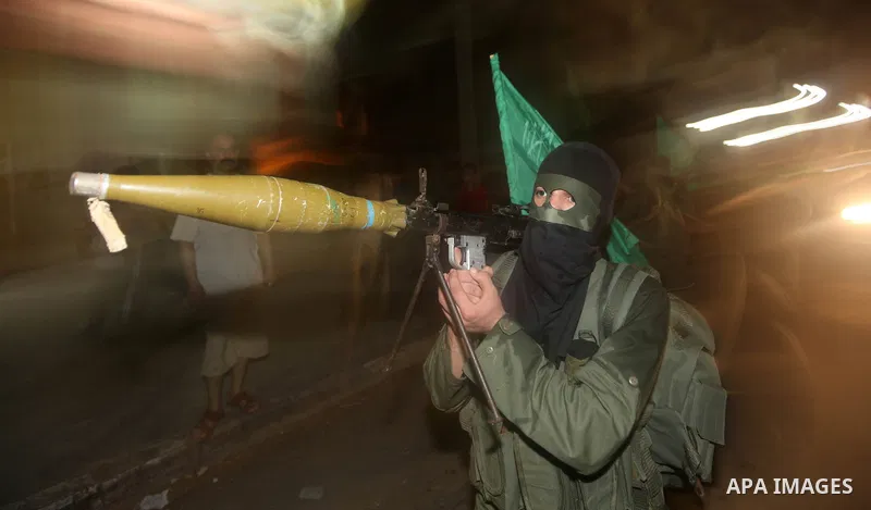 A Palestinian militant of Ezzedine al-Qassam Brigade, the military wing of the Palestinian Islamist movement Hamas which rules Gaza, participates in an anti-Israel military show in Gaza City October 1, 2012. Photo by Maj...
