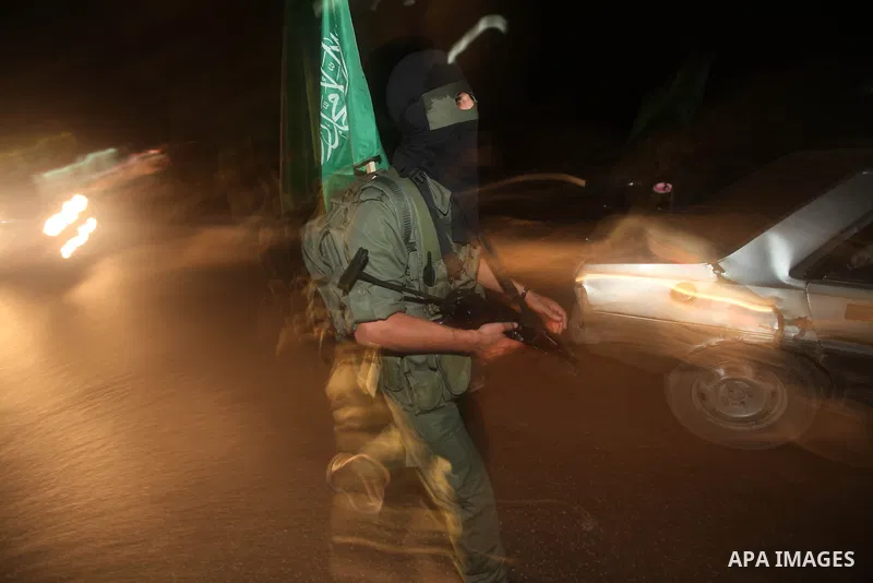 A Palestinian militant of Ezzedine al-Qassam Brigade, the military wing of the Palestinian Islamist movement Hamas which rules Gaza, participates in an anti-Israel military show in Gaza City October 1, 2012. Photo by Maj...