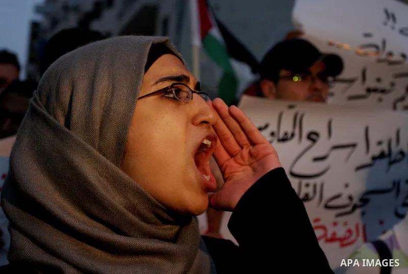 Palestinian protesters from the West Bank town of Ramallah, march towards the Palestinian Presidential compound as they hold slogans against the Palestinian Authority security forces, in Ramallah, West Bank, 02 October 2...
