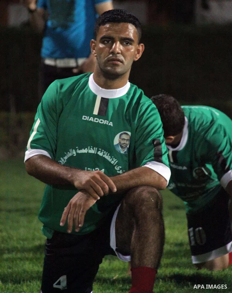 Mahmud Sarsak, Palestinian football player, plays with the team of al-Shijaia and Rafah Youth Club, in Yarmouk Stadium in Gaza city, on Oct. 02, 2012. Photo by Alaa Shamaly