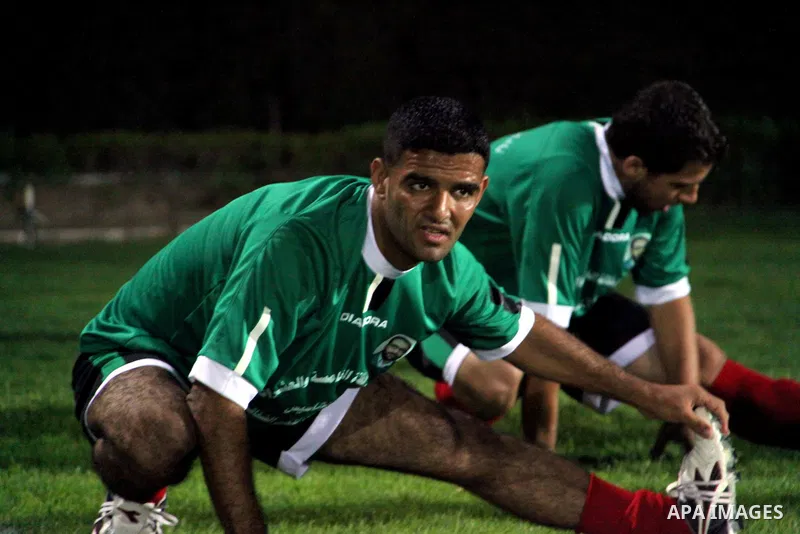 Mahmud Sarsak, Palestinian football player, plays with the team of al-Shijaia and Rafah Youth Club, in Yarmouk Stadium in Gaza city, on Oct. 02, 2012. Photo by Alaa Shamaly