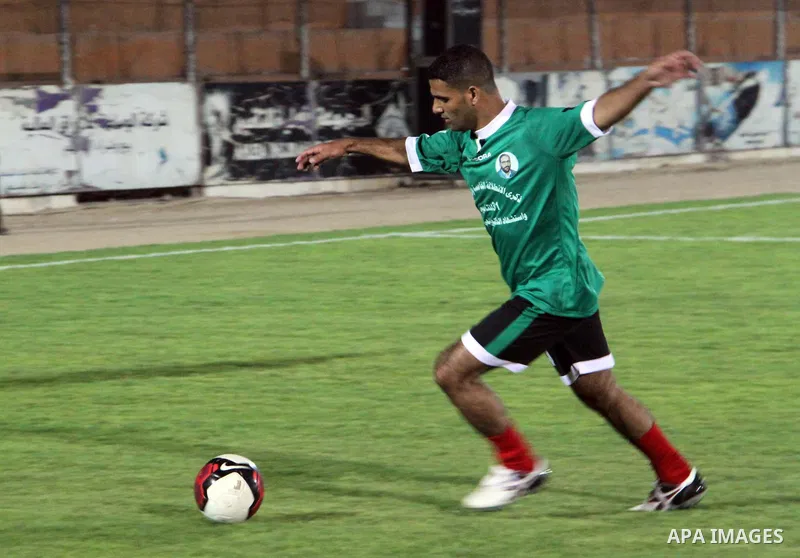 Mahmud Sarsak, Palestinian football player, plays with the team of al-Shijaia and Rafah Youth Club, in Yarmouk Stadium in Gaza city, on Oct. 02, 2012. Photo by Alaa Shamaly