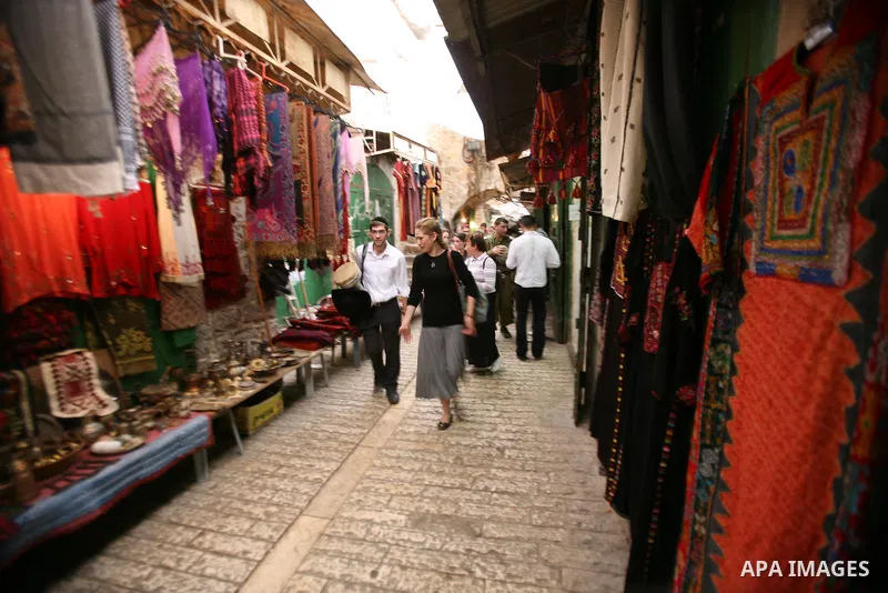 Jews shop at the market during the preparation for the celebration of Sukkot, the Feast of the Tabernacles, in in the West bank city of Hebron on Oct. 03, 2012. Temple before it was destroyed, perform a blessing ceremony...
