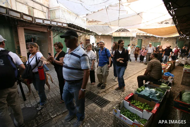 Jews shop at the market during the preparation for the celebration of Sukkot, the Feast of the Tabernacles, in in the West bank city of Hebron on Oct. 03, 2012. Temple before it was destroyed, perform a blessing ceremony...