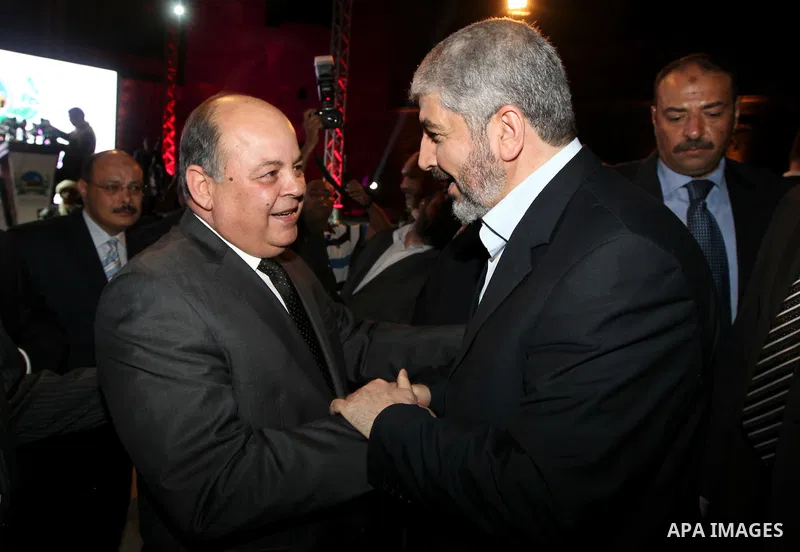 Palestinian Hamas leader Khaled Meshaal, shaking hands Minister of Culture Dr. Mohamed Saber Arab during ceremony of Al Fateh Al Salahi in Salah Al dein Citadel under the auspices of the Egyptian Ministry of Culture, in...