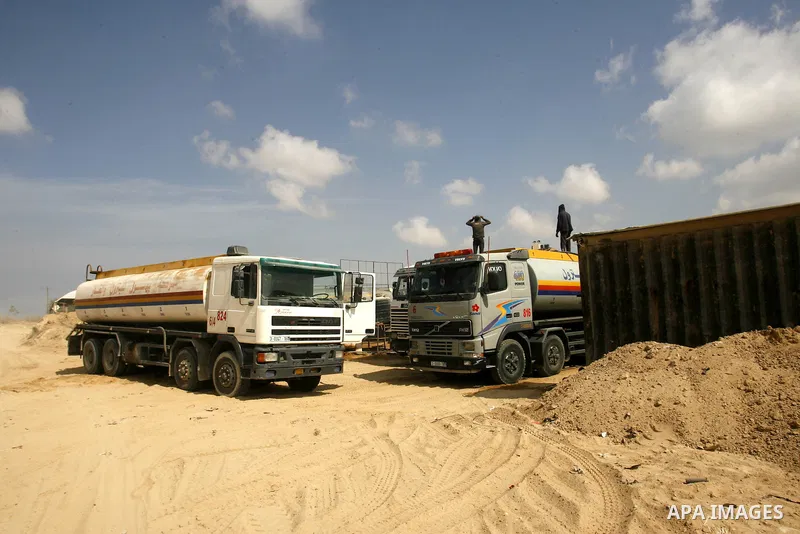 Palestinians tankers transport fuel smuggled from the tunnels along the Gaza-Egypt border in Rafah, in the southern Gaza Strip on Oct. 04, 2012. Since last month, Egyptian military have destroyed about 30 tunnels and blo...