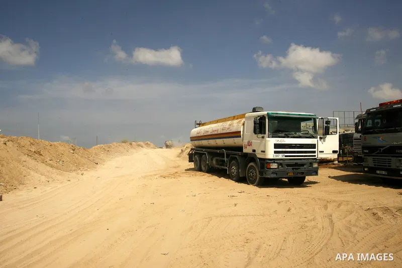 Palestinians tankers transport fuel smuggled from the tunnels along the Gaza-Egypt border in Rafah, in the southern Gaza Strip on Oct. 04, 2012. Since last month, Egyptian military have destroyed about 30 tunnels and blo...