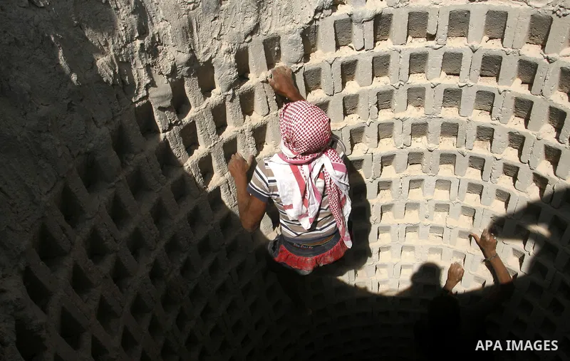 A Palestinian man ascend a tunnel along the Gaza-Egypt border in Rafah, in the southern Gaza Strip on Oct. 04, 2012. Since last month, Egyptian military have destroyed about 30 tunnels and blocked more which were used fo...