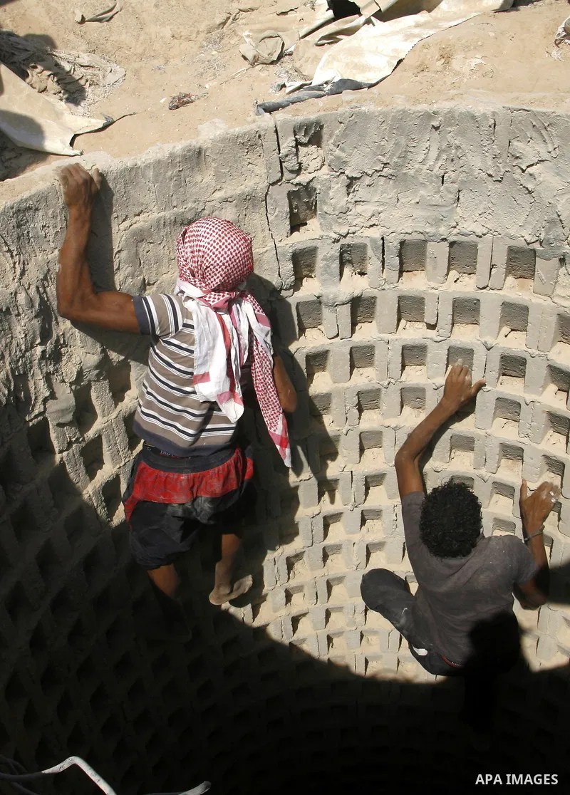 A Palestinian man ascend a tunnel along the Gaza-Egypt border in Rafah, in the southern Gaza Strip on Oct. 04, 2012. Since last month, Egyptian military have destroyed about 30 tunnels and blocked more which were used fo...