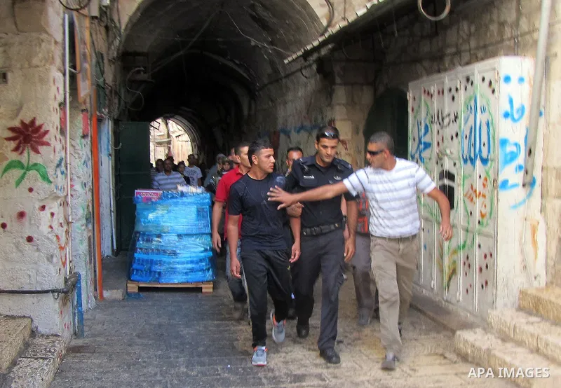 Israeli policemen stand guard during clashes with Palestinian protesters on the protesters known to Muslims as the Noble Sanctuary and to Jews as the Temple Mount in Jerusalem's Old City Oct. 04, 2012. Photo by Mahfouz A...