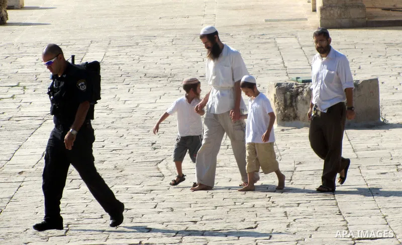 Israeli policemen stand guard during clashes with Palestinian protesters on the protesters known to Muslims as the Noble Sanctuary and to Jews as the Temple Mount in Jerusalem's Old City Oct. 04, 2012. Photo by Mahfouz A...