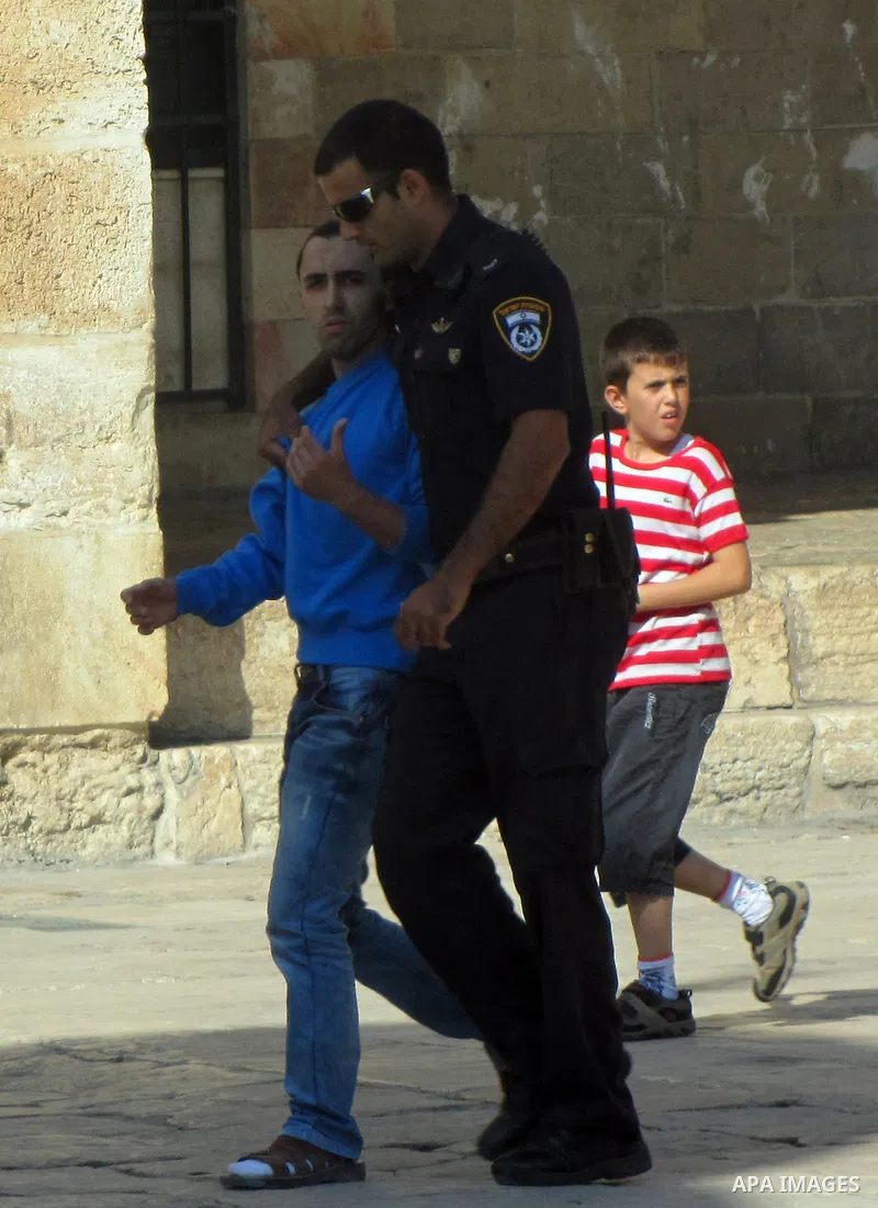 Israeli policemen stand guard during clashes with Palestinian protesters on the protesters known to Muslims as the Noble Sanctuary and to Jews as the Temple Mount in Jerusalem's Old City Oct. 04, 2012. Photo by Mahfouz A...