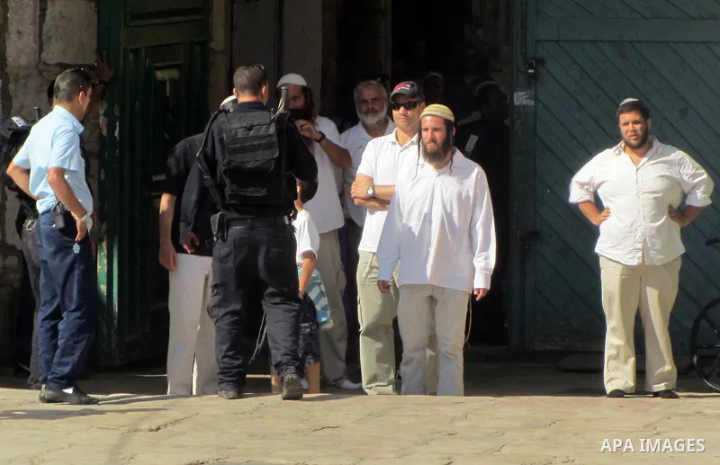 Israeli policemen stand guard during clashes with Palestinian protesters on the protesters known to Muslims as the Noble Sanctuary and to Jews as the Temple Mount in Jerusalem's Old City Oct. 04, 2012. Photo by Mahfouz A...
