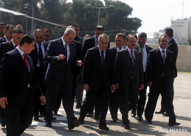 Palestinian Prime Minister Salam Fayyad, and Jordanian Prime Minister Fayez Al Tarawneh arrive at Palestinian President Mahmoud Abbas headquarters in the West Bank city of Ramallah, Oct. 4, 2012. Photo by Issam Rimawi