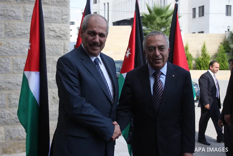 Palestinian Prime Minster Salam Fayyad, and his Jordanian counterpart Fayez al-Tarawneh at Fayyad's office in the West Bank city of Ramallah, 04 October 2012. Photo by Issam Rimawi