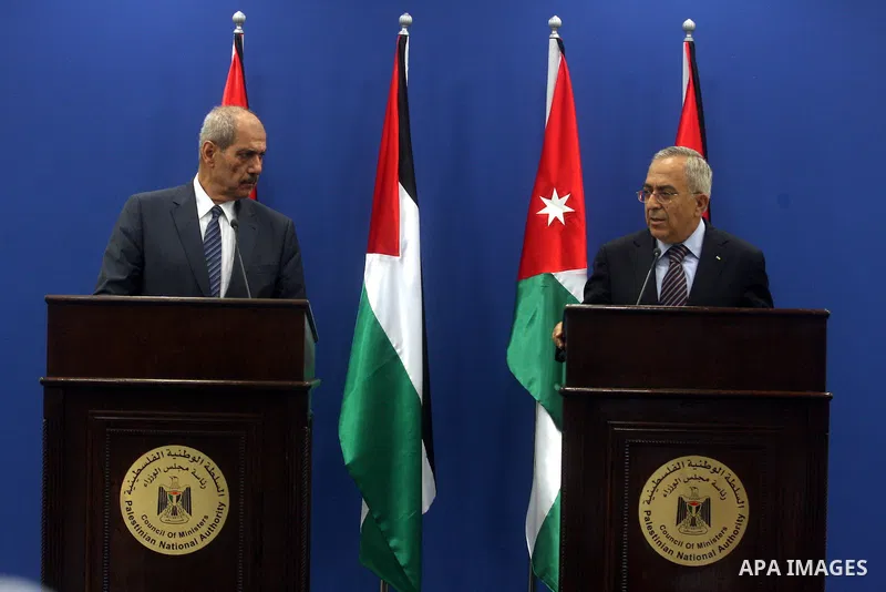 Palestinian Prime Minster Salam Fayyad, and his Jordanian counterpart Fayez al-Tarawneh during a press conference at Fayyad's office in the West Bank city of Ramallah, 04 October 2012.. Photo by Issam Rimawi