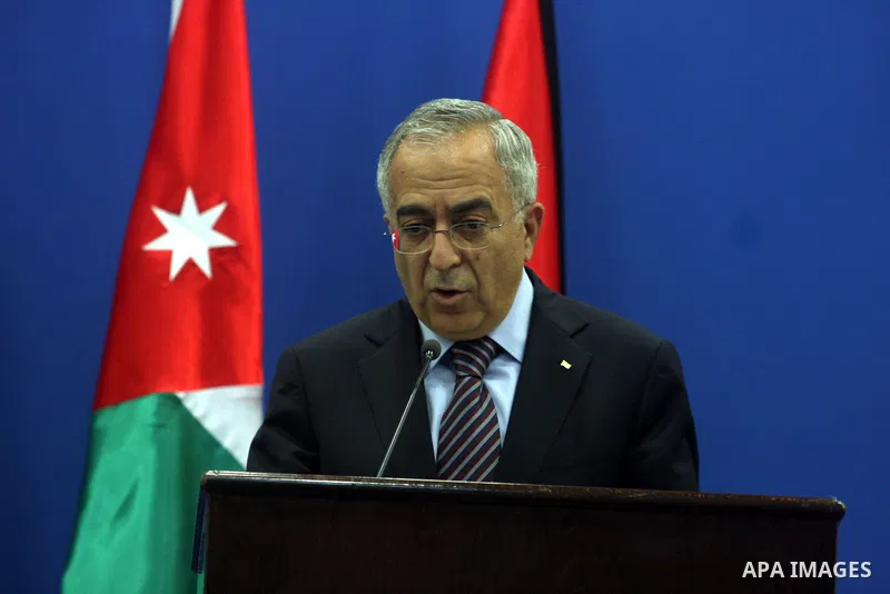 Palestinian Prime Minster Salam Fayyad, and his Jordanian counterpart Fayez al-Tarawneh (unseen) talks during a press conference at Fayyad's office in the West Bank city of Ramallah, 04 October 2012.. Photo by Issam Rima...