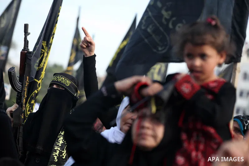Female Islamic Jihad militants take part in a ceremony marking the 25th anniversary of the movement's establishment and the 17th anniversary of the death of the group's leader Fathi Shekaki in Gaza City October 4, 2012....