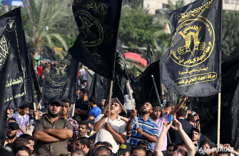 Palestinian supporters of Islamic Jihad movement take part in a ceremony marking the 25th anniversary of the movement's foundation and the 17th anniversary of the death of the group's leader Fathi Shekaki in Gaza City Oc...