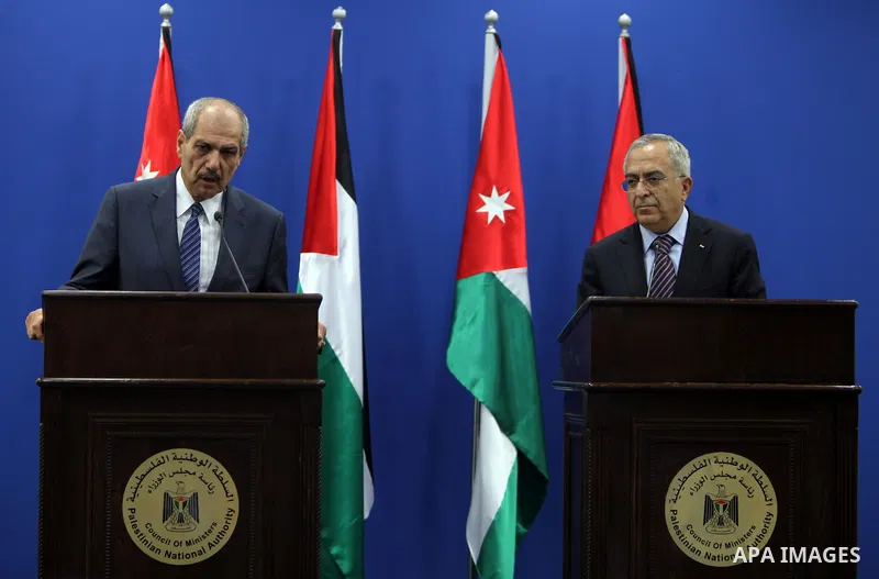 Palestinian Prime Minster Salam Fayyad, and his Jordanian counterpart Fayez al-Tarawneh during a press conference at Fayyad's office in the West Bank city of Ramallah, 04 October 2012. Photo by Mustafa Abu Dayeh