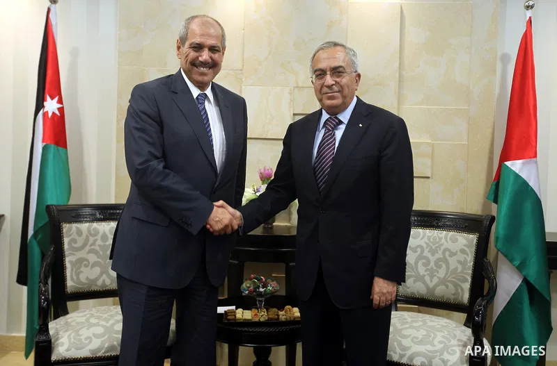 Palestinian Prime Minister meets with his Jordanian counterpart Fayez al-Tarawneh at Fayyad's office in the West Bank city of Ramallah, 04 October 2012. Photo by Mustafa Abu Dayeh