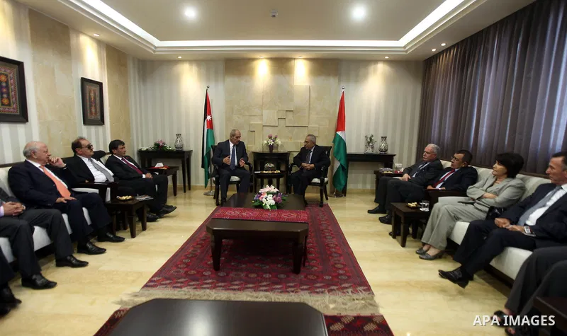 Palestinian Prime Minister meets with his Jordanian counterpart Fayez al-Tarawneh at Fayyad's office in the West Bank city of Ramallah, 04 October 2012. Photo by Mustafa Abu Dayeh