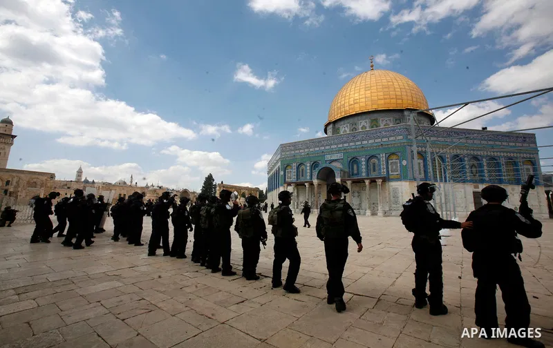 Israeli riot policemen take position near the Dome of the Rock during clashes at the Al Aqsa Mosque compound, known by the Jews as the Temple Mount, in Jerusalem's Old City, Friday, Oct. 5, 2012. Earlier this week, hardl...