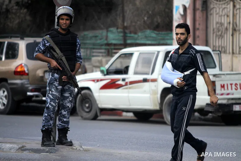 Palestinian security agencies of the Ministry of Interior Security, stand during maneuver to measure the ability of members of the security field settings in the event of any emergency, in Gaza City, on Oct. 06, 2012. Ph...