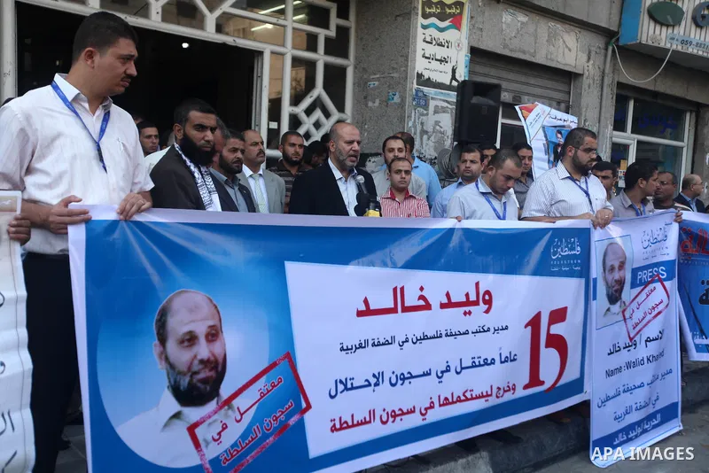 Palestinian journalists attend a protest against arrests of the journalists by the security forces in the West Bank, Gaza City on Oct. 06, 2012. Photo by Majdi Fathi