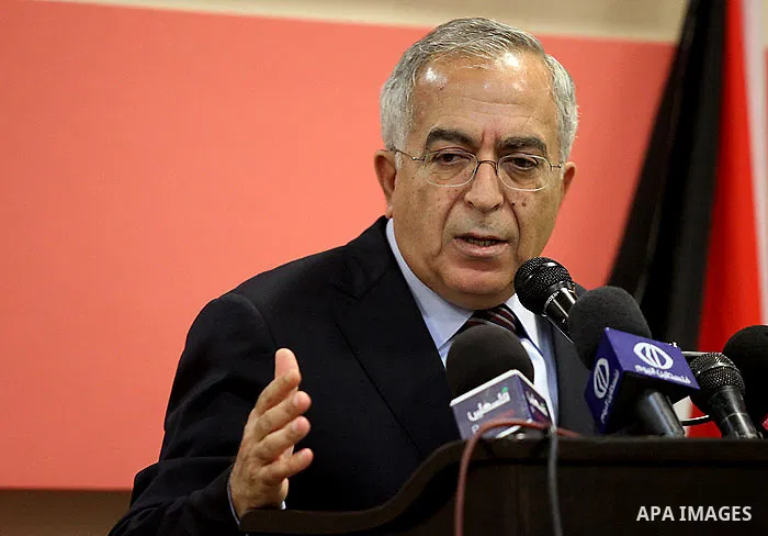 Palestinian Prime Minister Salam Fayyad speaks during the conference of support national economic and social rights, in the West Bank city of Ramallah, Oct. 06, 2012. Photo by Mustafa Abu Dayeh