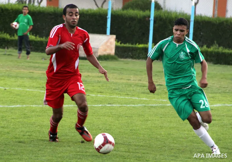 Palestinian soccer team of al-Ahly and the team of Rafah play during the 4th round in the premier league in Gaza city on Oct. 06 2012. Photo by Alaa Shamaly
