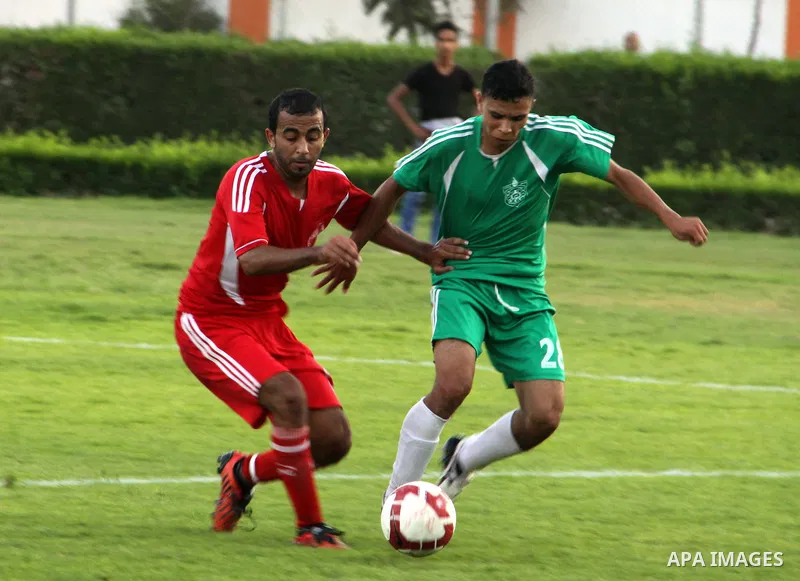 Palestinian soccer team of al-Ahly and the team of Rafah play during the 4th round in the premier league in Gaza city on Oct. 06 2012. Photo by Alaa Shamaly