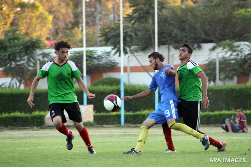 Palestinian soccer team of Shijaia and the team of Nusseirat services play during the 4th round in the premier league in Gaza city on Oct. 07 2012. Photo by Alaa Shamaly
