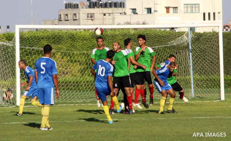 Palestinian soccer team of Shijaia and the team of Nusseirat services play during the 4th round in the premier league in Gaza city on Oct. 07 2012. Photo by Alaa Shamaly
