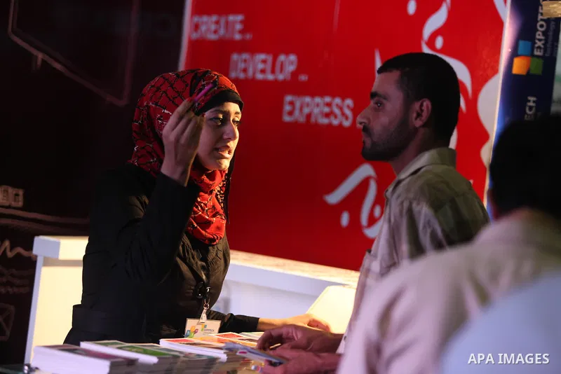 Palestinians participate in an Palestine's Technology Week "Expotech" in Gaza city on Oct. 09, 2012. Photo by Majdi Fathi