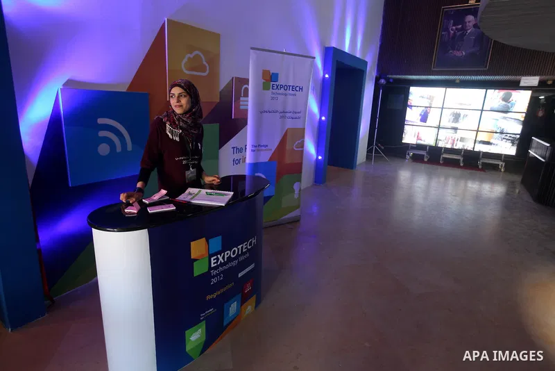 Palestinians participate in an Palestine's Technology Week "Expotech" in Gaza city on Oct. 09, 2012. Photo by Majdi Fathi
