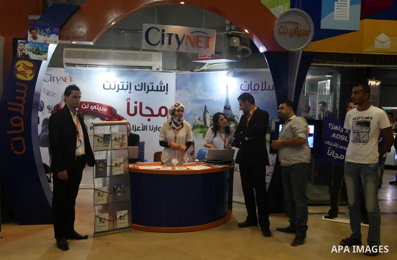 Palestinians participate in an Palestine's Technology Week "Expotech" in Gaza city on Oct. 09, 2012. Photo by Majdi Fathi