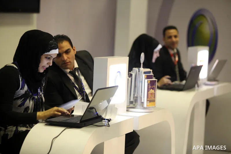 Palestinians participate in an Palestine's Technology Week "Expotech" in Gaza city on Oct. 09, 2012. Photo by Majdi Fathi