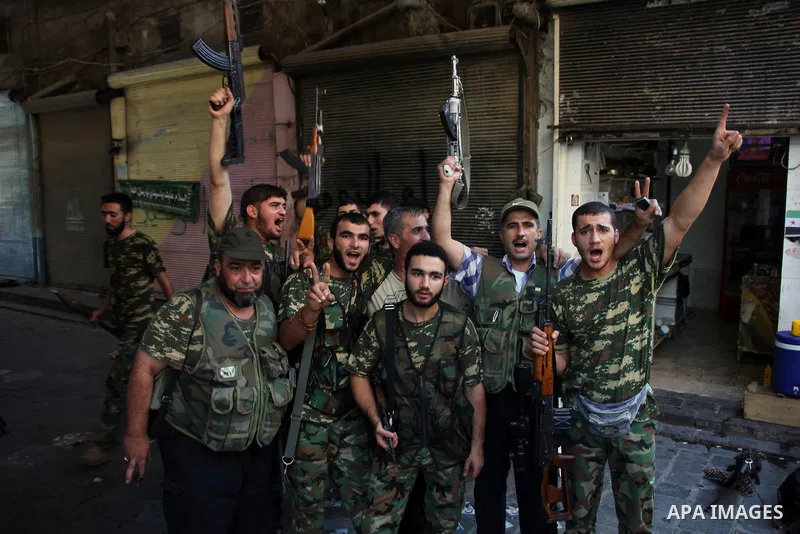 Free Syrian Army take position during clashes with regime forces in Aleppo in northern Syria on September 08, 2012. Photo by Ahmed Deeb