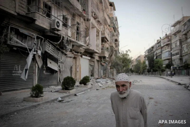 Syrians inspect damages in the old city of Aleppo after the area was shelled by Syrian regime forces on September 08 2012. Forces loyal to President Bashar al-Assad shelled rebel-held areas across Syria as fierce clashes...