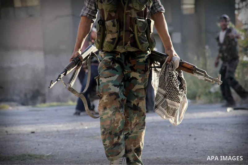 Free Syrian Army take position during heavy clashes with Syrian government forces , in the Old Town of Aleppo, September 07, 2012, to retake control of the large Hanano army base in Aleppo. Photo by Ahmed Deeb