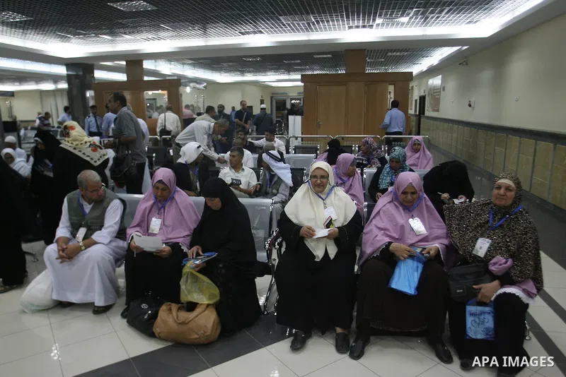 Palestinian pilgrims wait at a hall after they cross the Rafah border crossing into Gaza Strip, in the southern Gaza strip town of Rafah on Oct. 09, 2012. Hundreds of Palestinian pilgrims will cross into Gaza Strip on th...