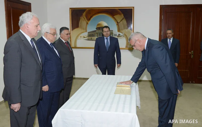 Palestinian President Mahmoud Abbas (Abu Mazen) during the sworn of ambassador of the State of Palestine to Kuwait Rami Ihsan Tahboub in the West bank city of Ramallah on Oct. 09, 2012. Photo by Thaer Ganaim