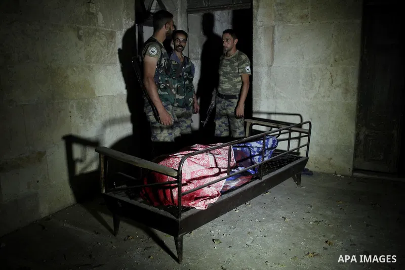 A dead Syrian man in al-Hazazeh neighborhood in the old city of Aleppo after the area was shelled by Syrian regime forces on September 22 2012. Photo by Ahmed Deeb