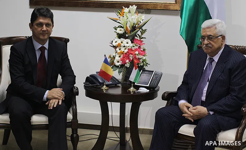 Palestinian President Mahmoud Abbas (R) meets with Romanian Foreign Minister Titus Corlatean (L) in the West Bank city of Ramallah, Oct. 10, 2011. Corlatean is on an official visit to the region. Photo by Issam Rimawi
