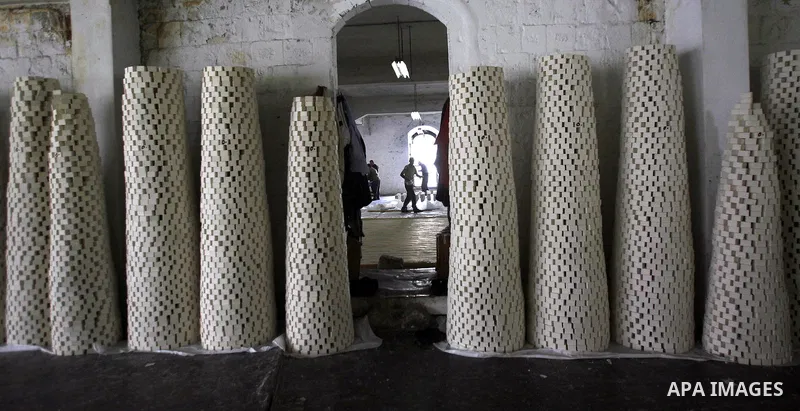 A Palestinian worker lines up soap pieces at the Touqan factory in the West Bank city of Nablus, on Oct. 11, 2012. The Touqan factory is one of the oldest manual factories in Nablus that manufactures the natural ''Nabuls...