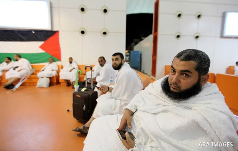 Palestinian Muslim pilgrims arrive at the King Abdulaziz international airport as they prepare to go for their pilgrimage to Mecca, Oct. 12,2012. The event is held in preparation for carrying out the five pillars of Isla...
