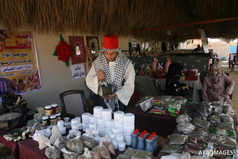 Palestinians man participates in an exhibition Palestinian Heritage in Khan Younis in the southern Gaza Strip, on October 14, 2012. Photo by Eyad Al Baba